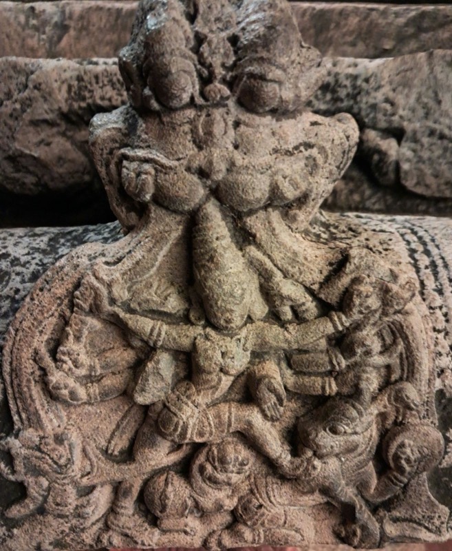 A stone carving of a deity